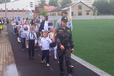 У Білорусі чиновники одягли дітей у військову форму та погнали на парад