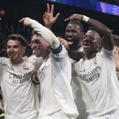 Real and Emirates logos