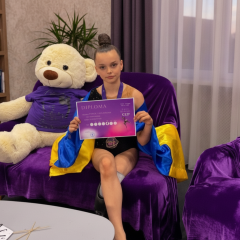 Nine-year-old gymnast on a prosthetic leg