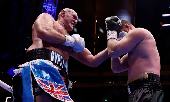 Tyson defeats Mahmudov and calls out Joshua for a fight