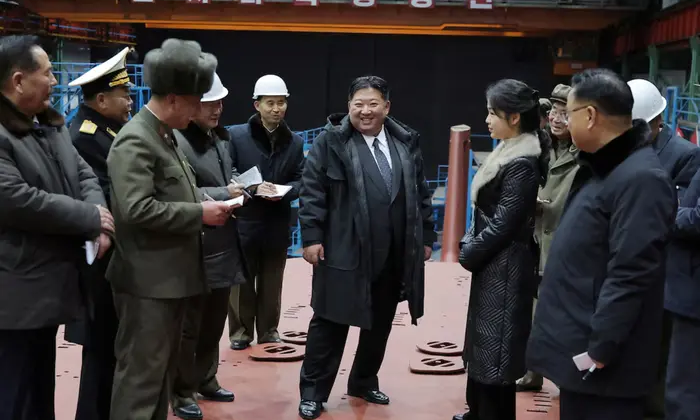 Kim Jong Un observes the missiles