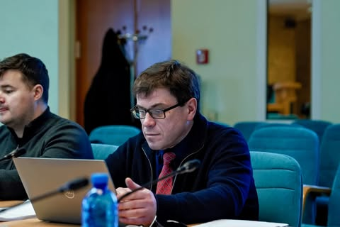 Logos of potential investors on the table