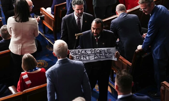Congressman being escorted out due to Trump's sign
