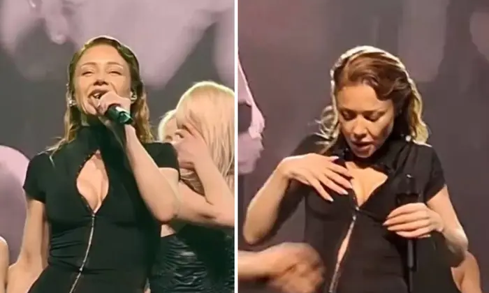 Tina Karol on stage at Muzvar Awards: dress unzipped, performance continued