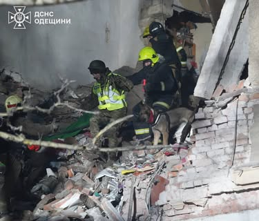 Rescuers search for people under rubble