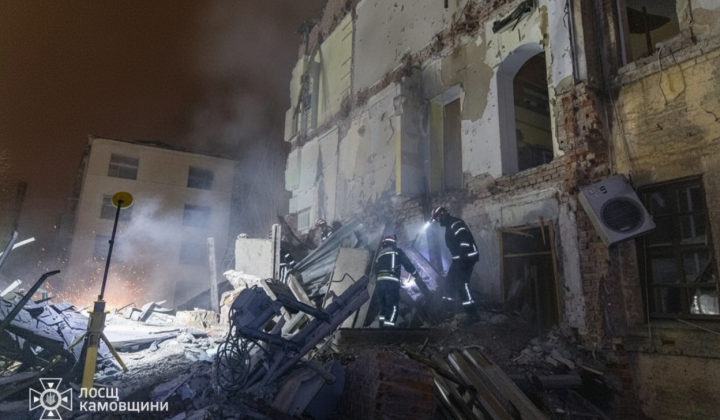 Bodies of a boy and a woman under the rubble