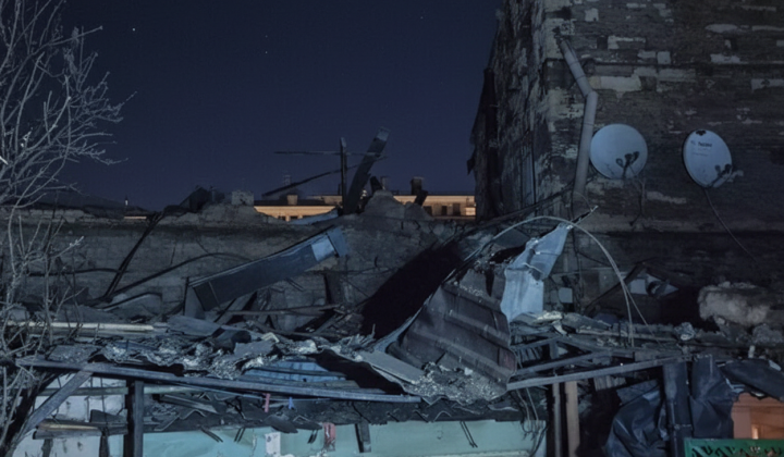 Damaged buildings, injured woman in Odessa
