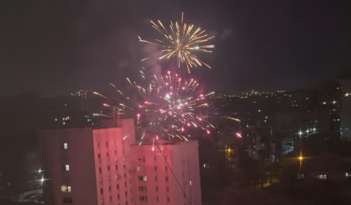 Teenager launching fireworks in Kyiv