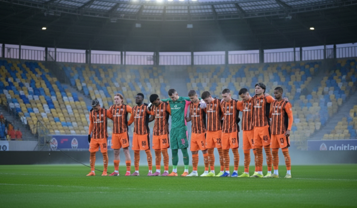 Football players and coach of the round