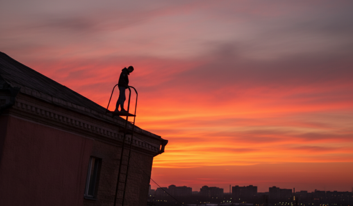 Young man on the roof in Vyshhorod
