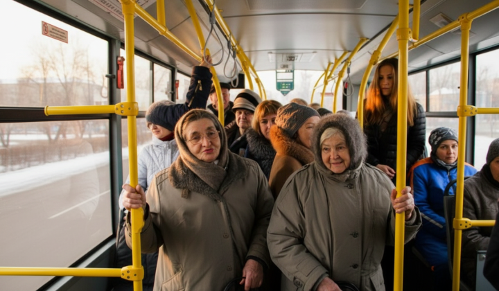 Seniors on bus with free pass card