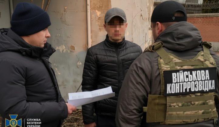 Photo of FSB agent with Dnipro in the background